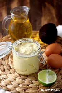 a jar of whipped cream on a woven rattan